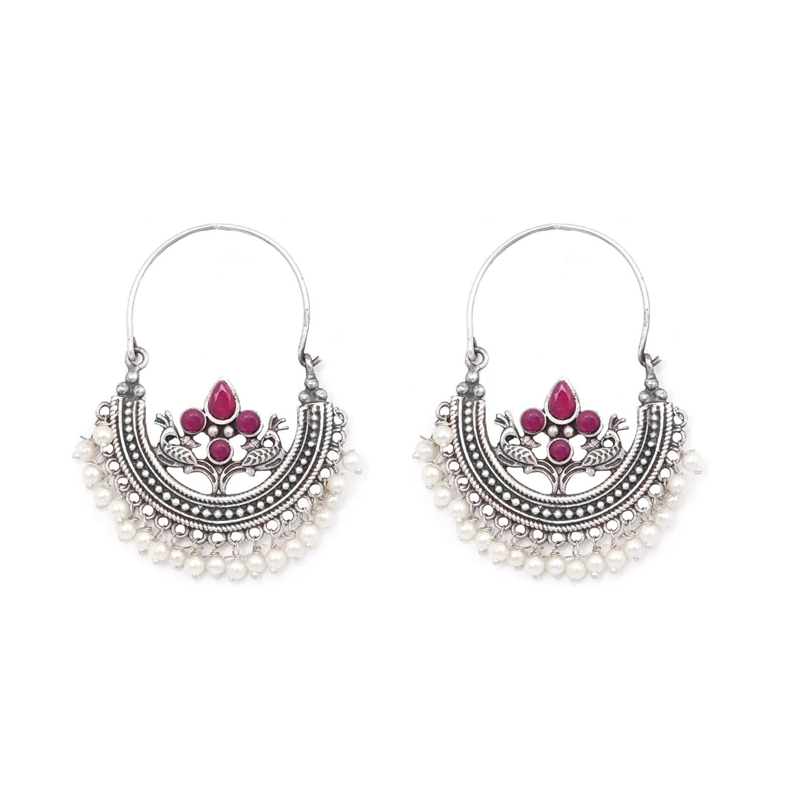Front view of Saara peacock oxidised hoop earrings with red stones and white faux pearl drops
